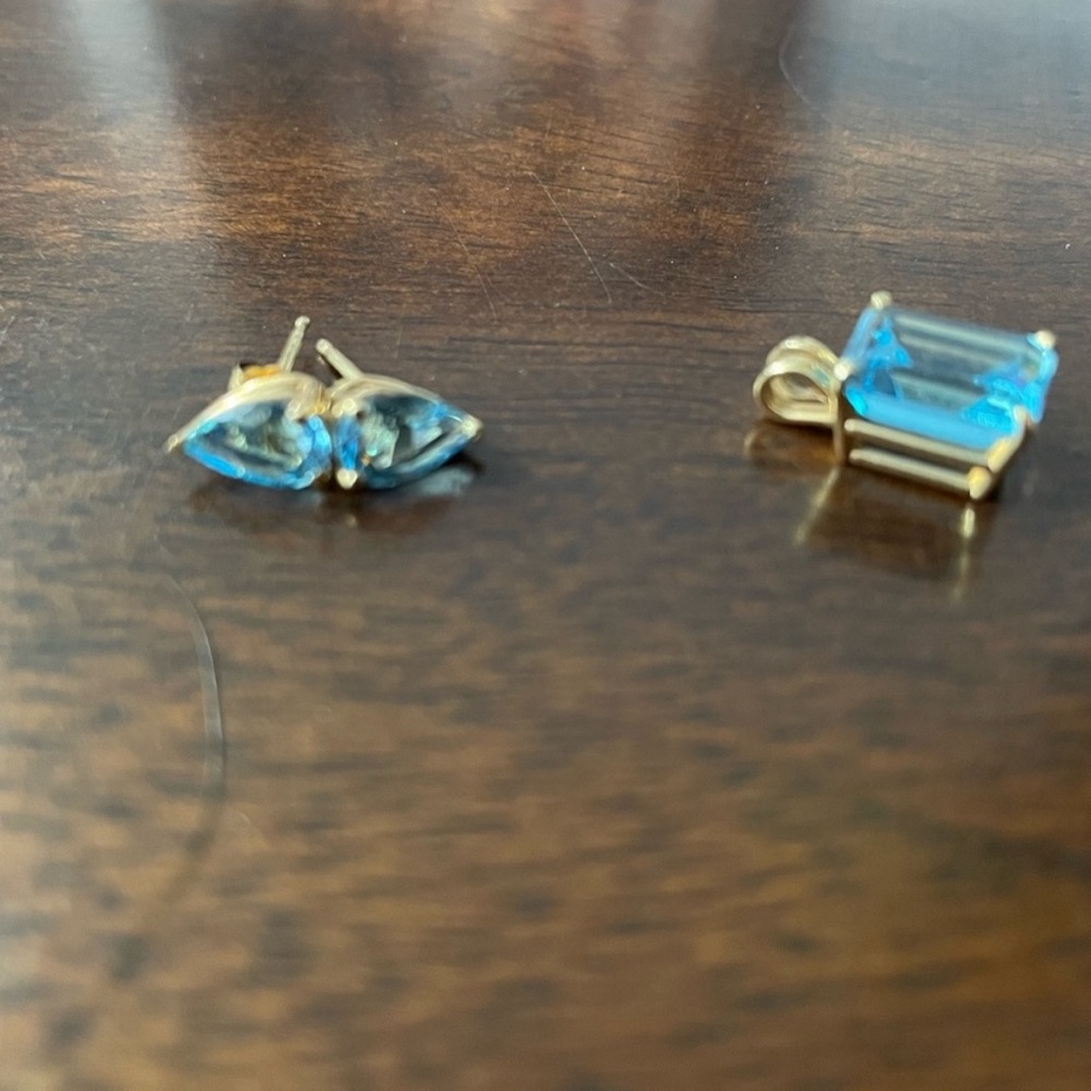 Blue topaz, earrings, and pendant. 14kt gold